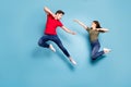 Full size photo of crazy man two people woman man spouses disagree jump fight kick boxing wear green red t-shirt denim Royalty Free Stock Photo