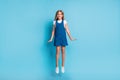 Full size photo of crazy positive blond girl jumping wear white t-shirt dress shoes on pastel blue color