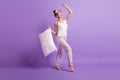 Full size photo of happy excited smiling dreamy girl dancing good morning hold pillow isolated on violet color Royalty Free Stock Photo