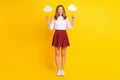 Full size photo of impressed little girl with bubbles wear shirt skirt bag sneakers isolated on yellow background Royalty Free Stock Photo