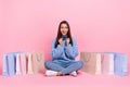 Full size photo of impressed young brunette lady do shoping wear sweater jeans shoes isolated on pink background Royalty Free Stock Photo