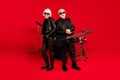 Full size photo popular artist old rock music group man bass guitarist woman drum player ready perform new composition