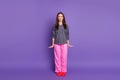 Full size photo of positive cheerful girl enjoy day dreaming holiday nap wear good look pajama isolated over violet Royalty Free Stock Photo