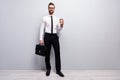 Full size photo positive cool smart freelancer promoter man hold cafeine beverage mug hold modern handbag ready