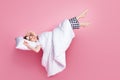 Full size photo of pretty lady saturday nap lying bed pillow blanket sleep and walk raise legs empty space wear mask Royalty Free Stock Photo