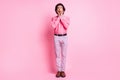 Full size photo of shocked charming young man hold hands cheekbones unexpected present isolated on pink color background