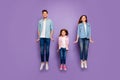 Full size photo of three jumping high family members wear casual clothes purple background