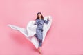 Full size photo of young attractive smiling cheerful positive girl in pajamas hold blanket isolated on pink color Royalty Free Stock Photo