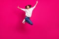 Full size photo of young cheerful girl happy positive smile jumper active sporty isolated over pink color background