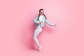 Full size photo of young excited girl happy excited have fun wear sunglass isolated over pastel color background