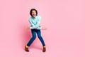 Full size photo of young handsome man have fun enjoy music dance excited crazy isolated over pink color background Royalty Free Stock Photo