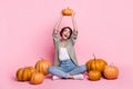 Full size photo of young lovely lady good mood pumpkin veggies meal nutrition isolated over pink color background Royalty Free Stock Photo