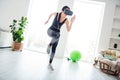 Full size photo of young serious beautiful athlete woman running fast speed exercising in vr glasses at home house