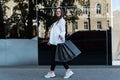 Full size photo of young woman go shopping for bargains. Happy beautiful girl with purchases. Black Friday, discount Royalty Free Stock Photo