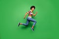 Full size profile side photo of positive cheerful afro american girl jump run after fall black friday bargain wear denim