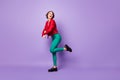 Full size profile side photo of young girl happy positive smile have fun dance look empty space isolated over purple Royalty Free Stock Photo