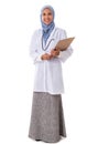 Full size of smiling muslim female doctor/nurse with empty blank clipboard isolated over white background Royalty Free Stock Photo