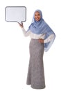 Full size of young happy asian Muslim woman wearing hijab holding white folder for text, isolated white background Royalty Free Stock Photo