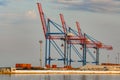 Full-slewing gantry crane in a seaport