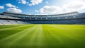 Full soccer field in stadium with empty blue bleacher seating Royalty Free Stock Photo