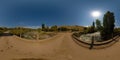 Spherical HDRi panorama of an old dusty bridge over mountain river at sunny autumn day Royalty Free Stock Photo