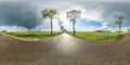 Full spherical seamless panorama 360 degrees angle view on no traffic asphalt road among alley and fields with awesome clouds