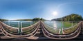 Full spherical seamless panorama 360 degrees angle view on steel frame construction of huge train railway bridge across laked. 360