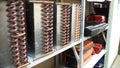 Full store room at the repair garage. Workshop tool board with various hand tools for repairing and woodworking. Clip.