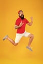 Full of strength and energy. Hipster dancing jumping. Feeling free. Running man yellow background. feel himself Royalty Free Stock Photo