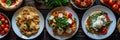 Full table of italian meals on plates Pizza, pasta, ravioli Royalty Free Stock Photo