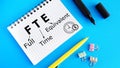 Full Time Equivalent FTE is shown using the text Royalty Free Stock Photo