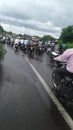 Full traffic on rainy road