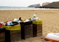 Full trash cans at beach