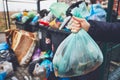 Full trash cans with rubbish bags