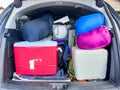 Full van packed for a camping trip with the back open. Royalty Free Stock Photo