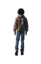 full view of a black African american boy wearing plaid winter shirt , jean pants and boots. black power hairstyle. green backpack Royalty Free Stock Photo