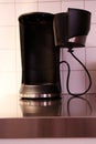 Full view of a coffee machine without its glass carafe. Opened filter hatch Royalty Free Stock Photo