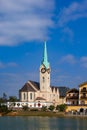 Full view and partial close-up of European-style steeple church, Gothic architecture