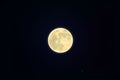 Full white moon isolated on dark starry sky, night background. Closeup moon and star light effect. G