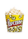 Full yellow bucket of popcorn, isolated on the white background. Royalty Free Stock Photo