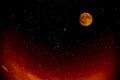 Full Yellow Moon is Shining in Starry Night Sky with Red and Orange Clouds, Germany, Europe Royalty Free Stock Photo