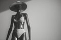 fulllength mannequin in a highcut swimsuit and beach hat Royalty Free Stock Photo