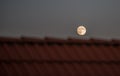 Fullmoon over roof Royalty Free Stock Photo