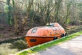 Kennet and Avon canal Wiltshire February 27 2019 Enclosed lifeboat converted for living in on the Kennet and Avon canal