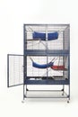 Fully equipped ferret cage on white background