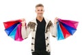 Fully excited man with heavy shopping bags. ready for holidays. male shopper isolated on white. beauty and fashion for Royalty Free Stock Photo