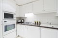 Fully fitted white kitchen Royalty Free Stock Photo