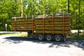 Fully loaded truck trailer with wooden pallets surrounded with wooden boards without Truck