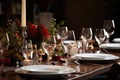 a fully set dinner table with fancy cutlery and plates Royalty Free Stock Photo