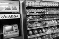 Grayscale of fully stocked shelves of food and household items at local Pick 'n Pay grocery store